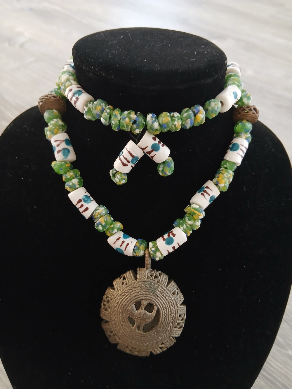 Handmade Green Beaded Necklace with White Accents and Bronze Pendant